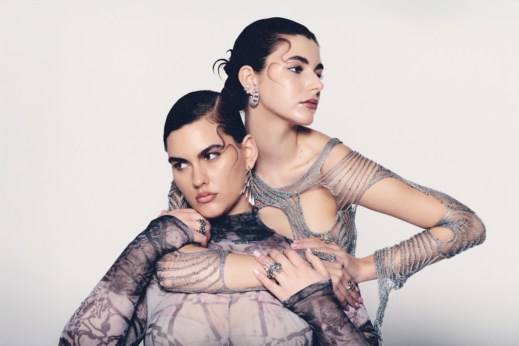 Mártusz Dorina — Jewellery editorial with two models in silver garments